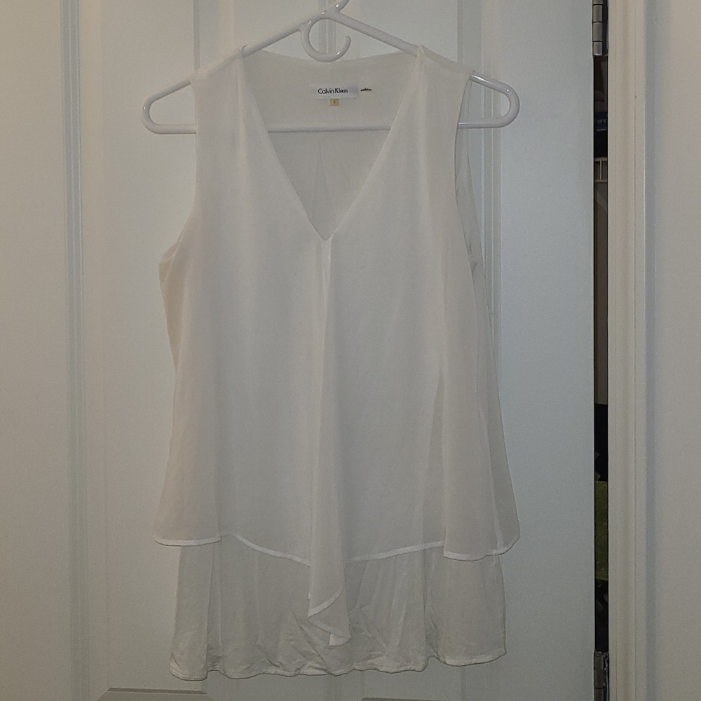 Silk sleeveless top GUC.